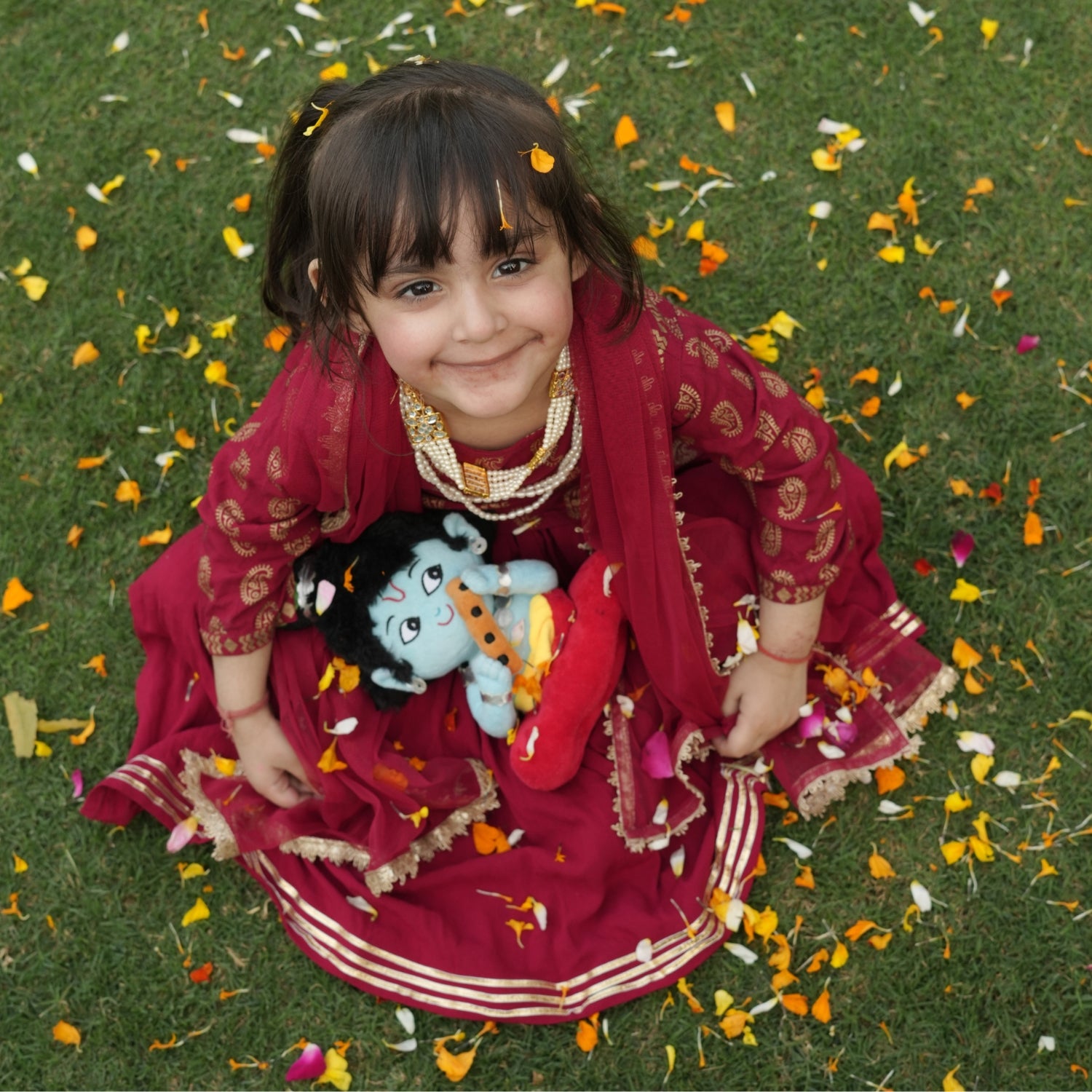 Small Baby krishna with little girl