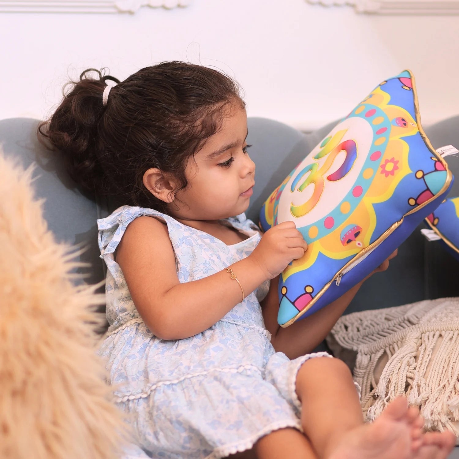 Om Cushion with baby girl